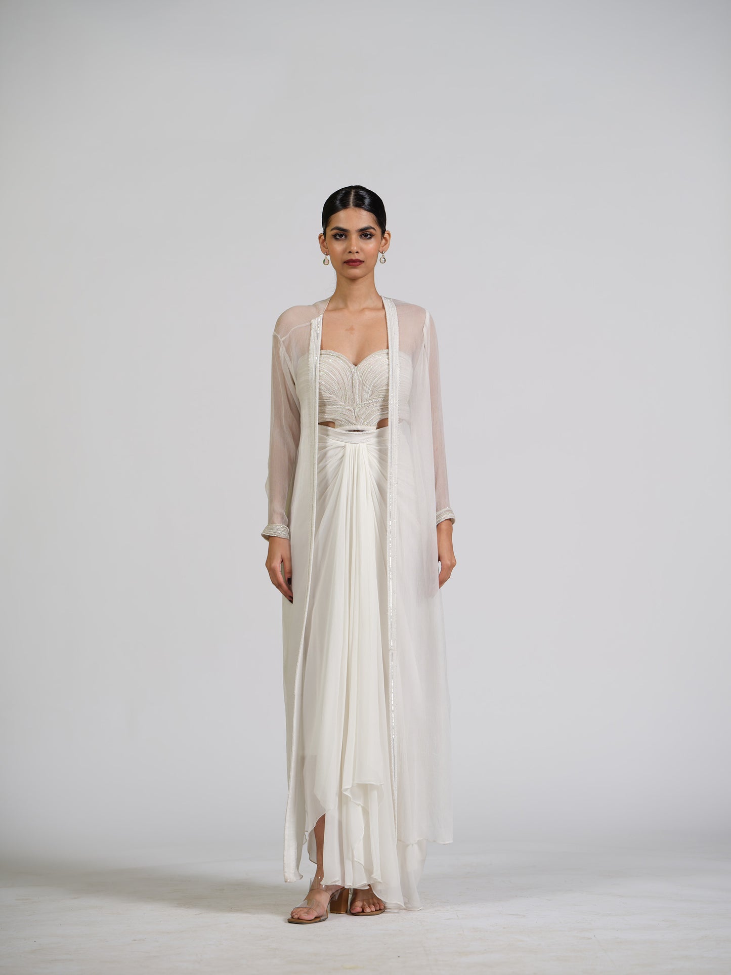 Lumiere Luxe Drape Skirt With Sculpted Center Drape Bustier Paired With Chiffon Flowy Cape