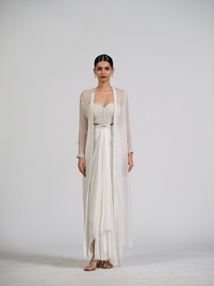 Lumiere Luxe Drape Skirt With Sculpted Center Drape Bustier Paired With Chiffon Flowy Cape