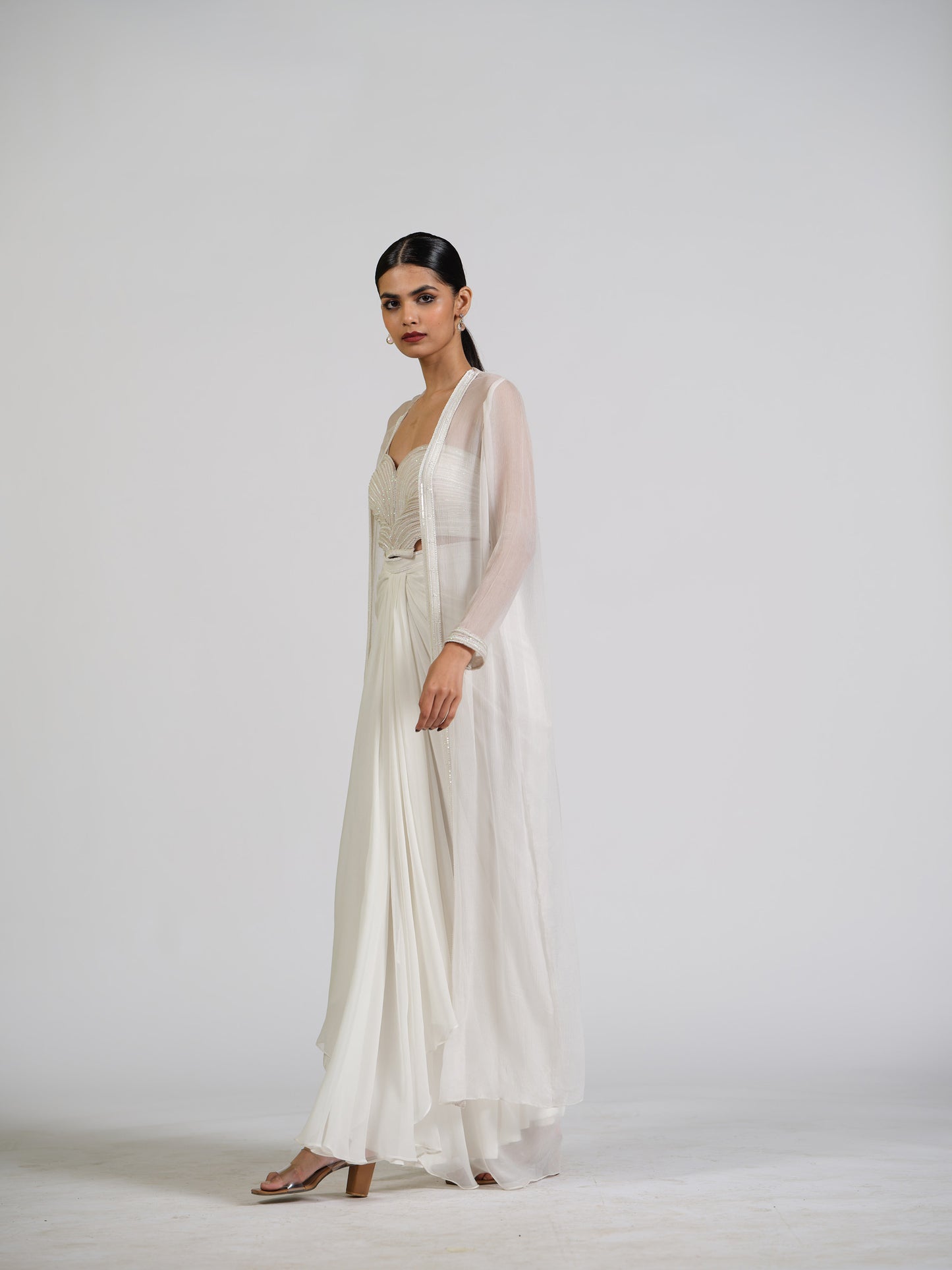Lumiere Luxe Drape Skirt With Sculpted Center Drape Bustier Paired With Chiffon Flowy Cape