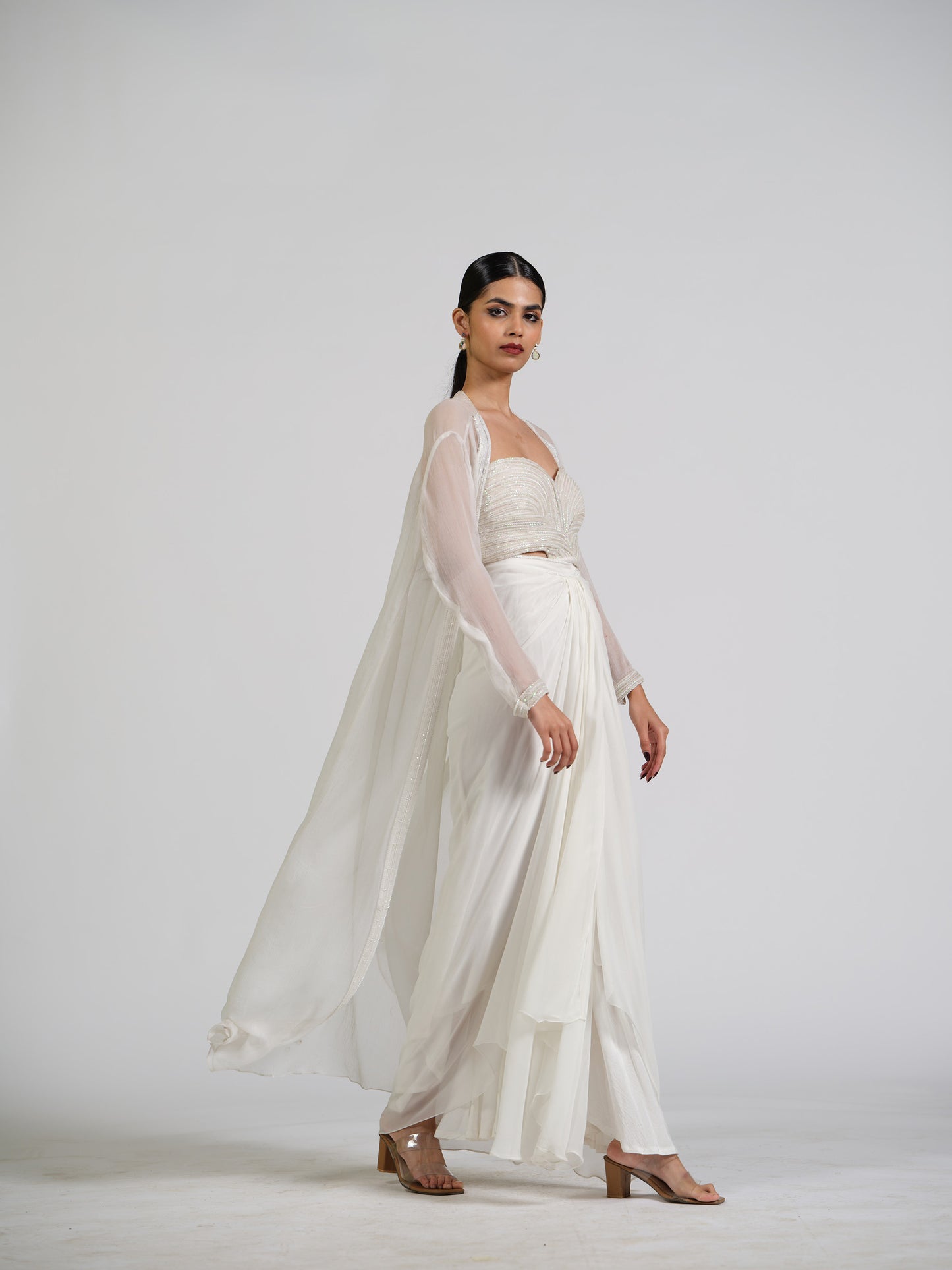 Lumiere Luxe Drape Skirt With Sculpted Center Drape Bustier Paired With Chiffon Flowy Cape