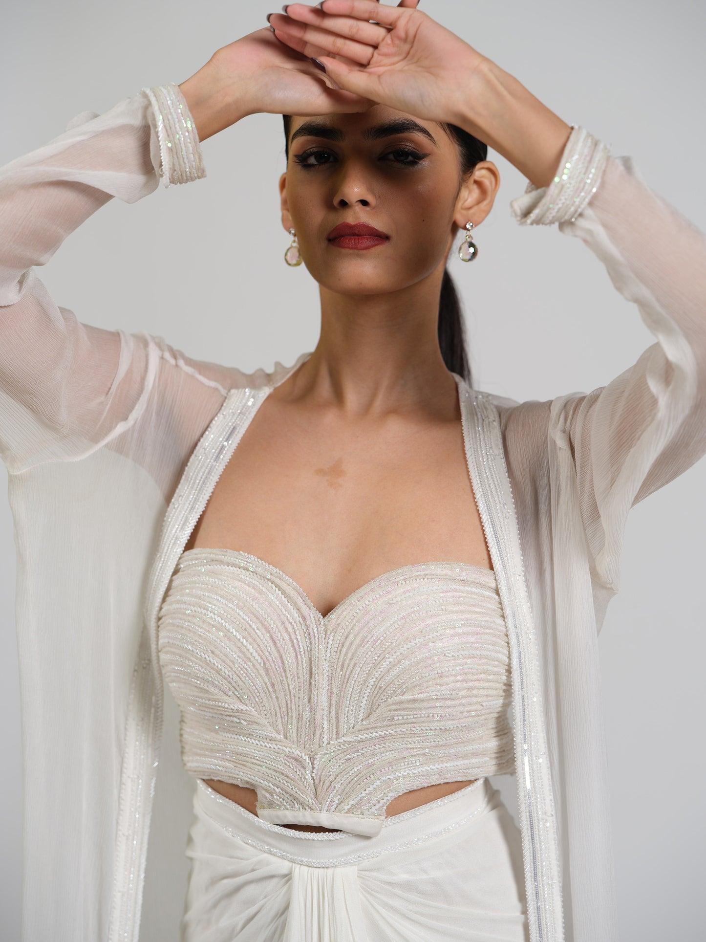 Lumiere Luxe Drape Skirt With Sculpted Center Drape Bustier Paired With Chiffon Flowy Cape