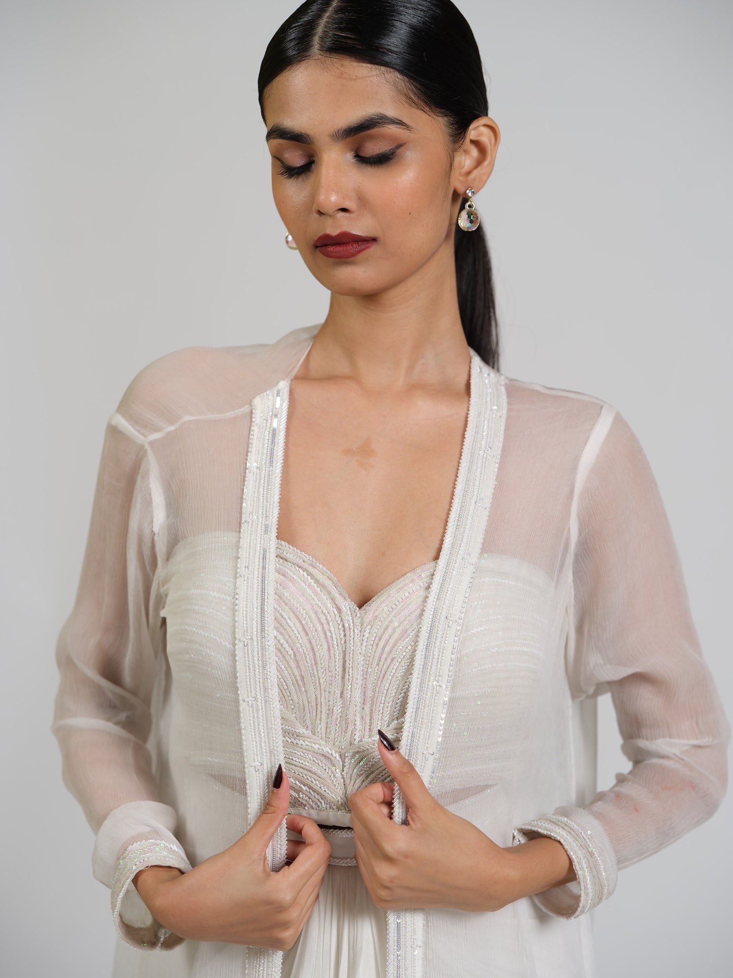 Lumiere Luxe Drape Skirt With Sculpted Center Drape Bustier Paired With Chiffon Flowy Cape