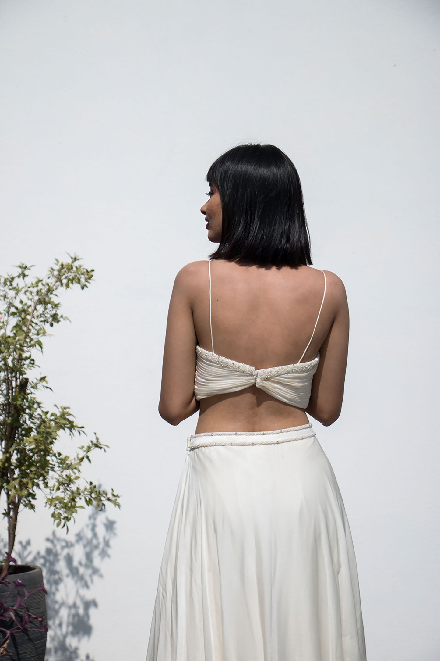 Off White Lehenga With Pleated Blouse